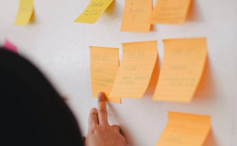 Marketer brainstorming and researching different SEO marketing examples