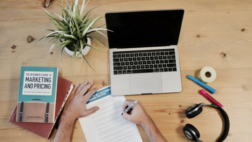 Marketer researching and planning an effective SEO marketing strategy