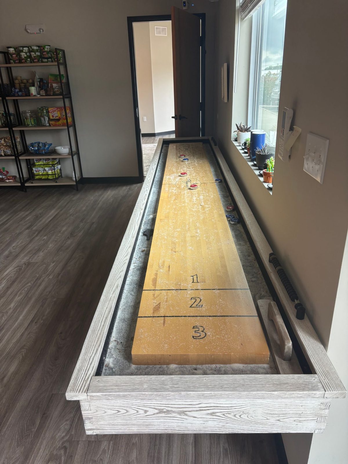 Shuffleboard table in the Relevance office
